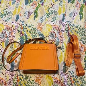 Steve Madden Bevelyn orange convertible crossbody bag‎ gently used